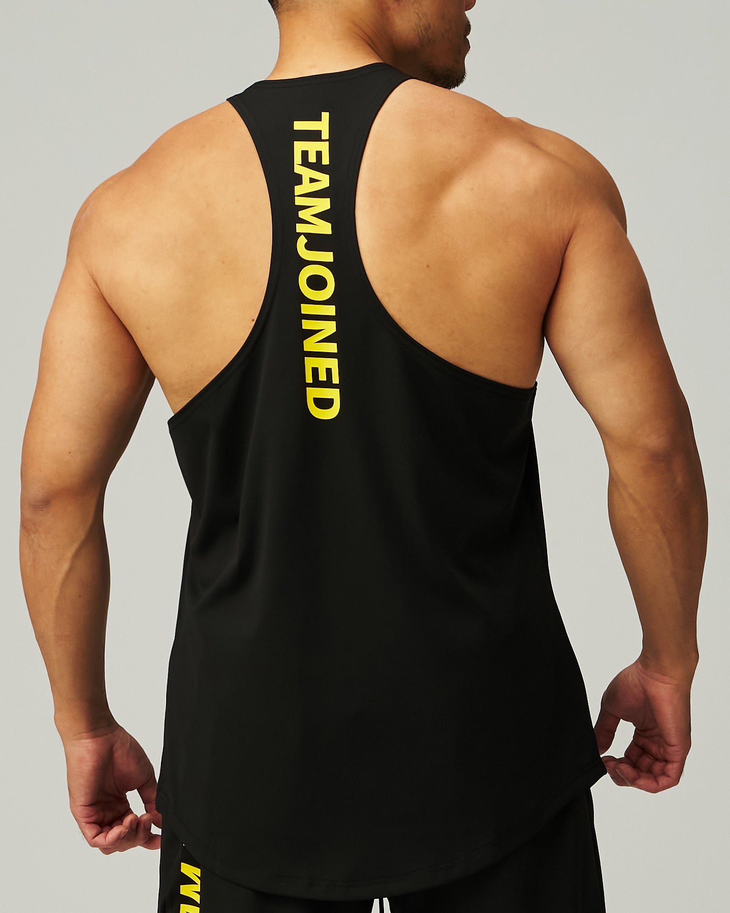 Adapt Spine logo Muscle Stringer